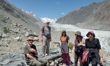 Travelers enjoy breathtaking views during a Hunza Valley adventure tour as part of a northern Pakistan tour experience.