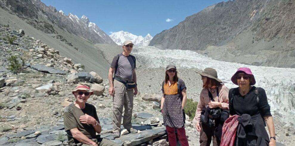 Travelers enjoy breathtaking views during a Hunza Valley adventure tour as part of a northern Pakistan tour experience.