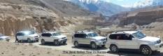 4x4 jeep driving through Hunza Valley mountains on a North Pakistan Adventure tour