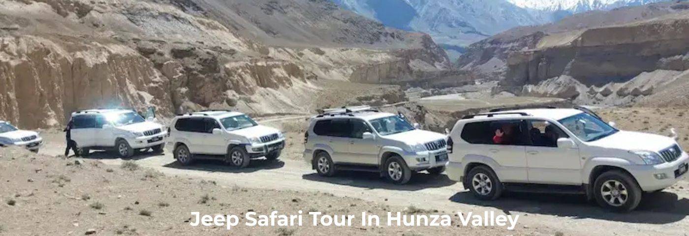 4x4 jeep driving through Hunza Valley mountains on a North Pakistan Adventure tour